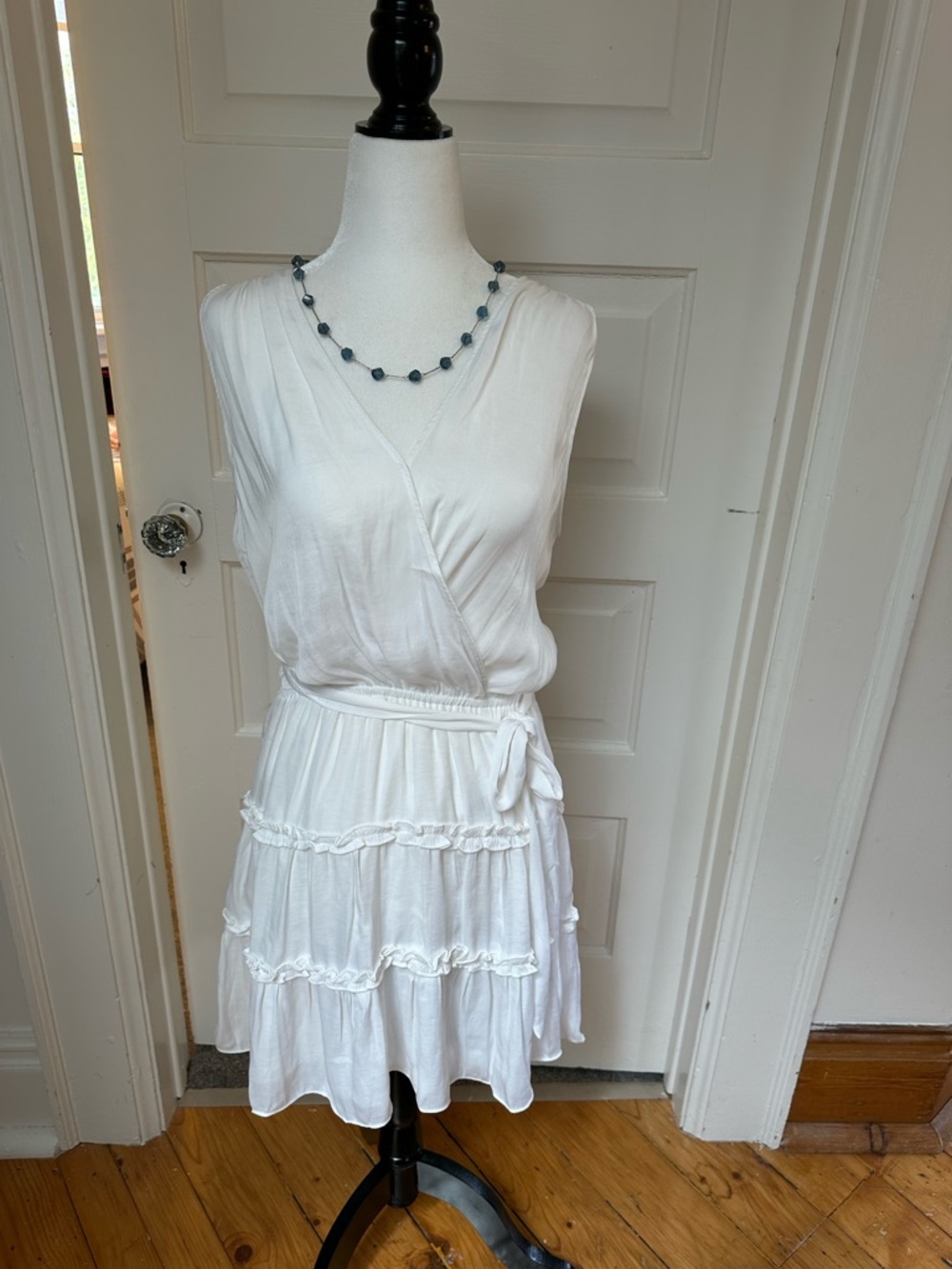 Naked Zebra flowy white dress.